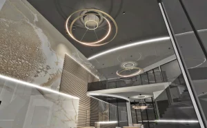 Elegancka przestrzeń restauracyjna Hotelu Korte z marmurowymi ścianami, nowoczesnym sufitem i designerskimi lampami.